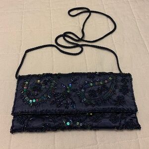 Valerie Steven’s evening beaded purple purse.
